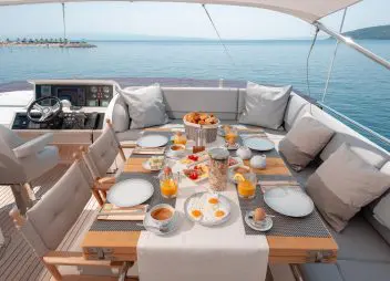 yacht charter fly bridge dining Champion