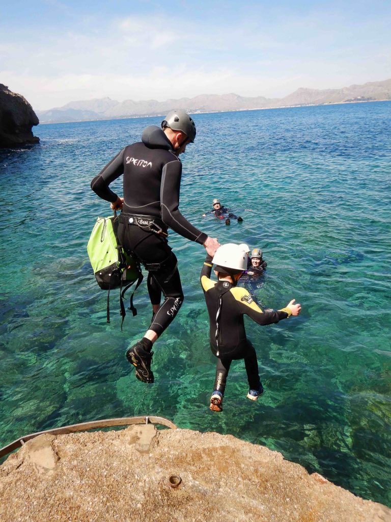 family cliff jumping Mallorca