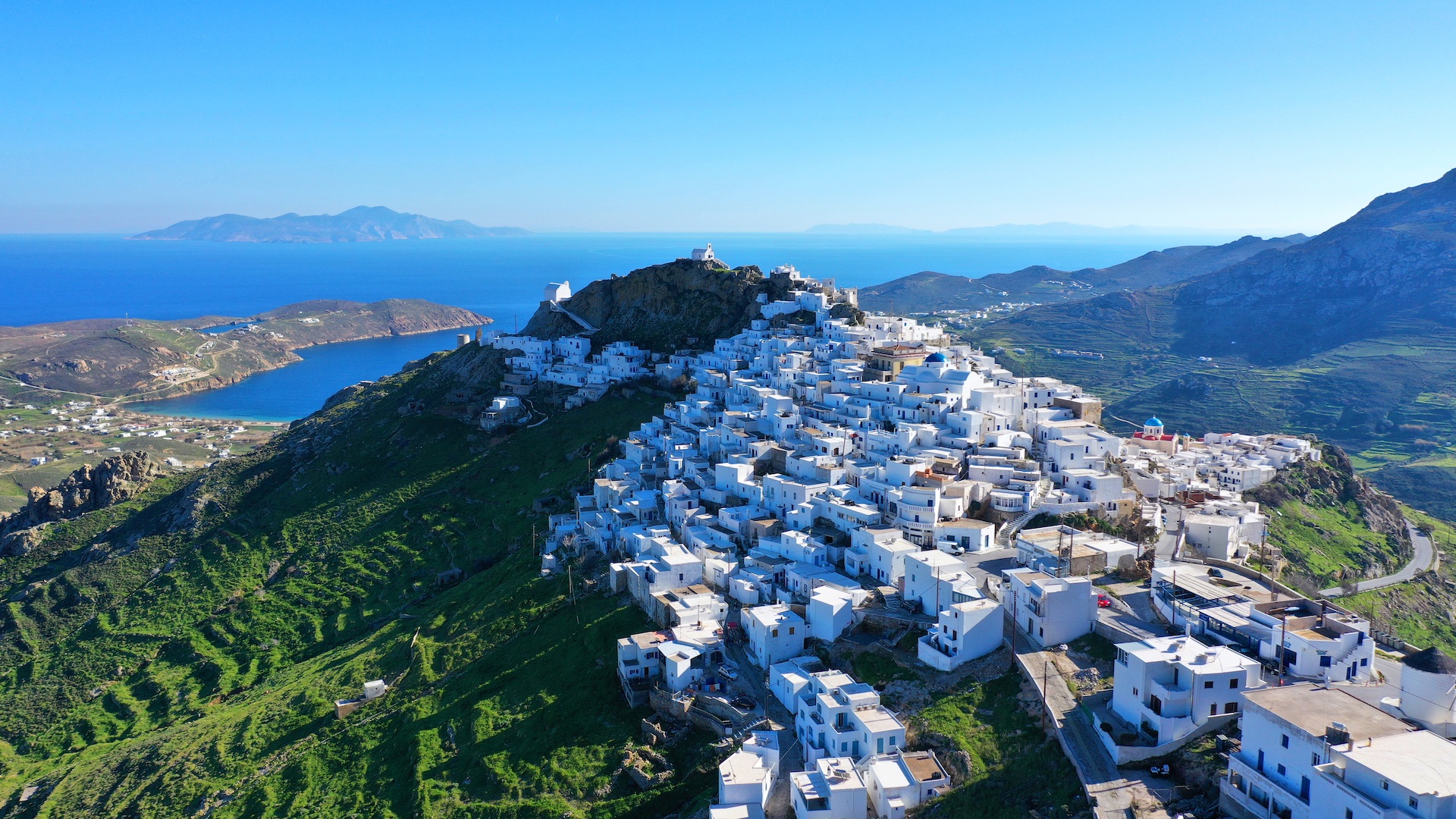 Aerial drone panoramic photo of picturesque main village or hora of Serifos island with breathtaking views to the Aegean sea in spring, Cyclades islands, Greece